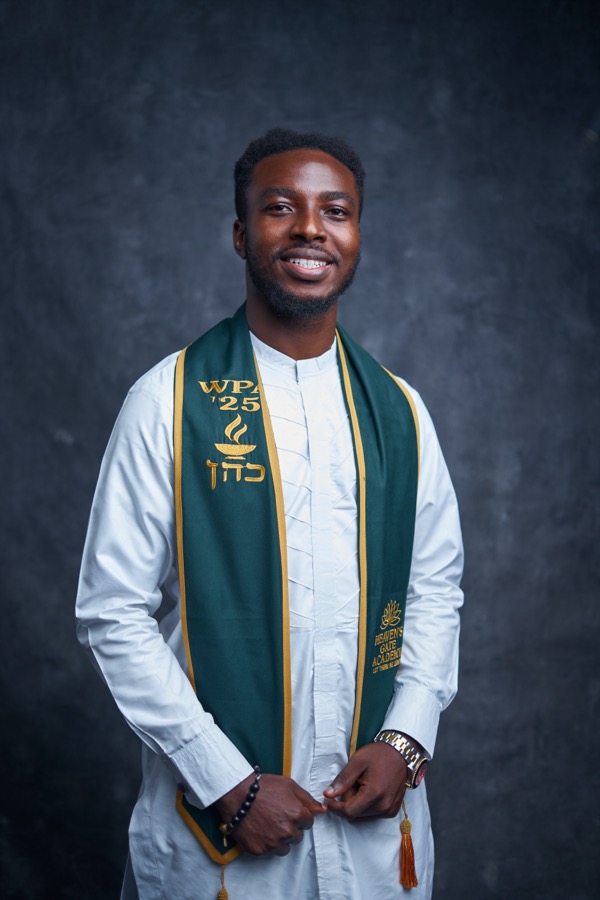 A WPA ’25 graduate in his ceremony stole